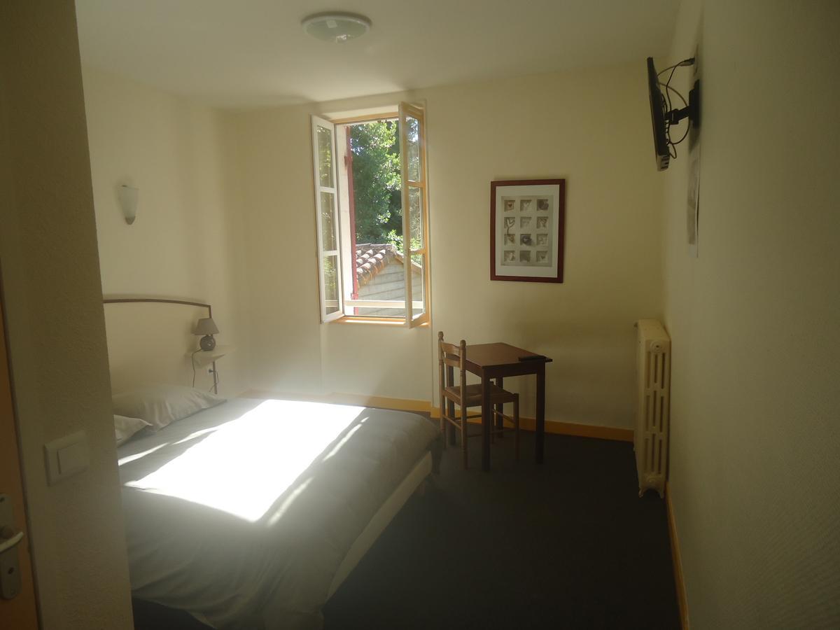 Logis Hotel Du Champ De Foire Saint-Aulaye-Puymangou Eksteriør bilde